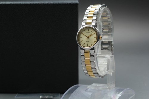 Montre femme ronde bicolore