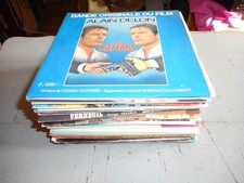Lot 49 VINYL  45 T musique de film ( E.Morricone /M.Jarre etc..)  en bon etat