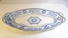 Grand plat ancien avec poignées signé HB