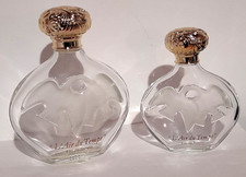 2 flacons anciens signés Lalique vides parfum 100 et 200 ml Nina Ricci