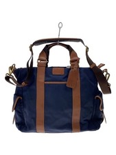 Sac en bandoulière TUMI, très bon état