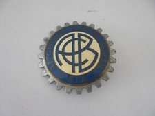 Plaque de calandre émaillée