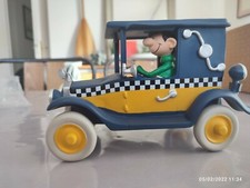 Figurine Gaston dans son taxi