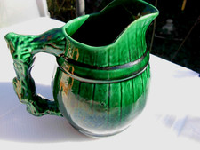 Beau pichet vert ancien pot en barbotines signé Longchamp France