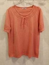 Pull rose saumon encolure