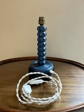 Pied de lampe en bois sculpté