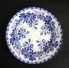 Plat rond ancien en faïence