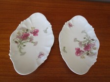 PAIRE DE RAVIERS / BEURRIERS  EN PORCELAINE DE LIMOGES DECOR FLORAL