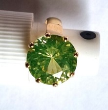 Bague Or 18 K avec Spinelle de synthèse ronde vert jaune taillerie du Mont d'or