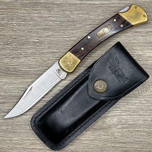 Buck 110 folding hunter - buck,