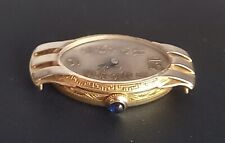 montre art déco or 18 k tête aigle 4,91 grs sans le mécanisme intérieur 