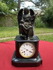 PENDULE EN BRONZE ET MARBRE