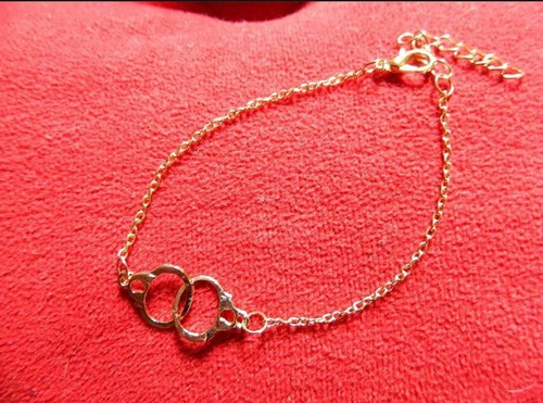 Bracelet menottes dorées - menottes, neuf