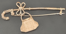 BIJOU ANCIEN BROCHE EPINGLE EN METAL DORE VINTAGE ET SAC A MAIN ATTACHE