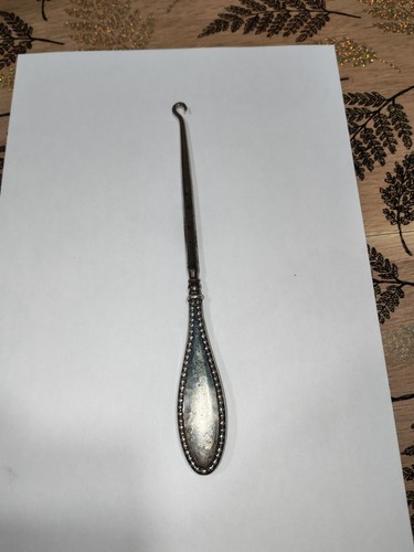 Rare tire lacets manche argent - tire-lacets,