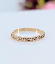 Bague demie-alliance sertie de 11 diamants d'environv 0,22cts au total Or 750 M