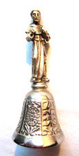 Cloche de table en métal couleur argent: Saint François d'Assise et un oiseau