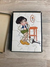 Boîte de puzzles anciens pour