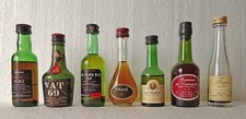 Lot 7 mignonnettes anciennes Whisky-Porto-Cognac-Liqueur.....