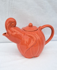 THEIERE EN CERAMIQUE COULEUR SAUMON TROMPE RECOURBEE / STYLE LIPTON