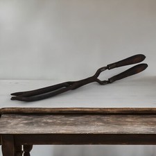 Ancien fer à friser en fer