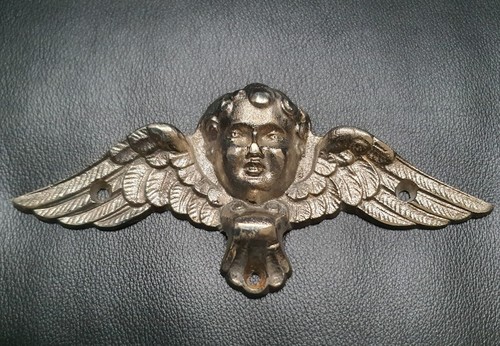 Decort porte cherubin - decort, ailé"