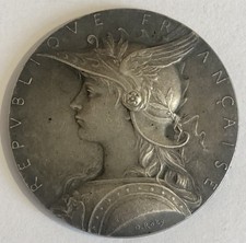 MÉDAILLE EN BRONZE ARGENTÉE