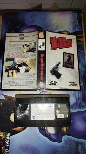 Vhs arme poing k7 - l'arme,