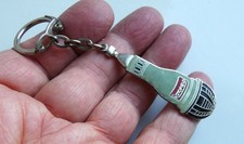 Ancien porte cle métal émaillé signé Duseaux ROTOFIELD.