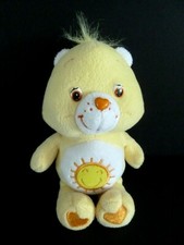 55. PELUCHE DOUDOU JEMINI OURS BISOUNOURS GROSJOJO SOLEIL JAUNE TBE