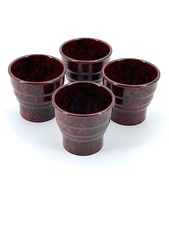 Ensemble de 4 jolis coquetiers en bakelite rouge mouchetée,  années 1930s