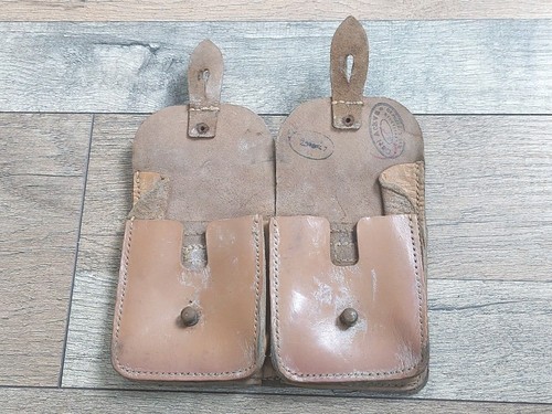 Une cartouchière cuir - une,