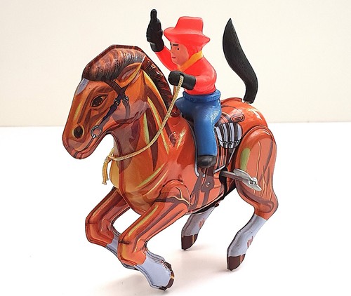 Jouet mécanique ancien cowboy - jouet,