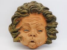 MASQUE MURAL EN TERRE CUITE VISAGE D'UN PERSONNAGE GROTESQUE DIAM 22CM AG30
