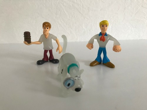 Lot trois figurines - ☻,