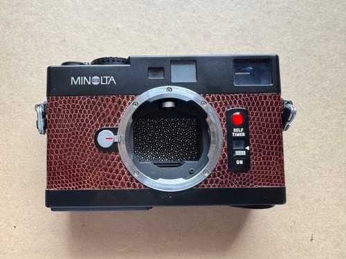 Minolta cle - minolta,