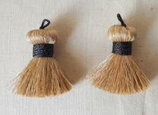 PASSEMENTERIE HOULES 1 PAIRE GROS POMPONS  COULEUR DORE  FIL GRIS REF 158PPTD