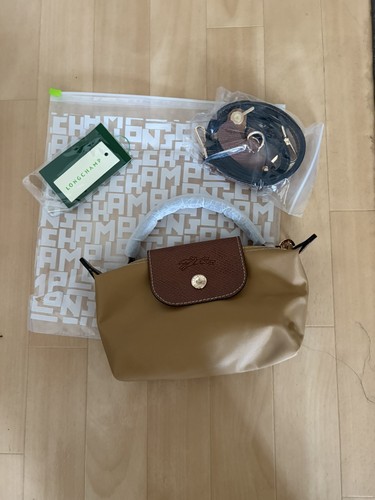 Sac longchamp presque - neuf,