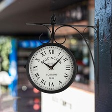 Horloge murale double face en