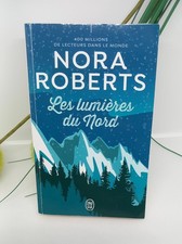 Livre de poche NORA ROBERTS " Les lumières du nord" Parfait état