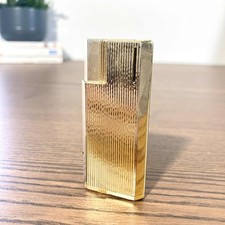 Briquet vintage doré strié – Style années 70 chic – Accessoire rétro élégant