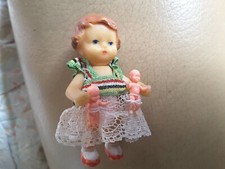 Ancienne petite poupée en
