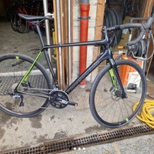 Cannondale vélo de route course. Ex locations reconditionné vert et noir.