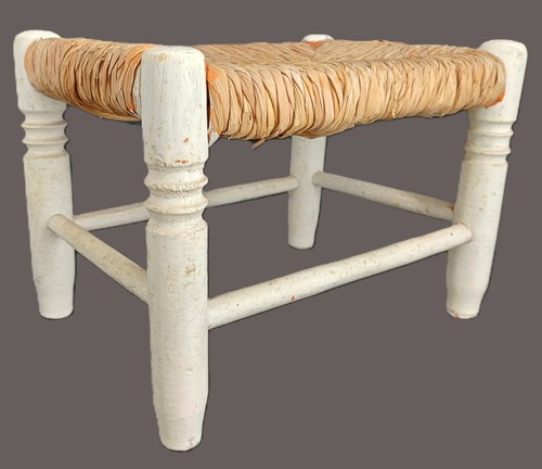 Petit tabouret repose - pieds, en