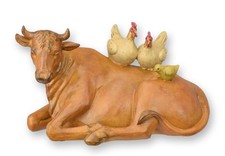 Une vache et des poules en