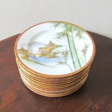 Japon. Kutani. 12 assiettes à