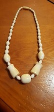 Collier de perles en ivoire