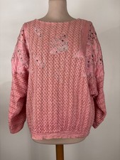 Pull rose typique vintage