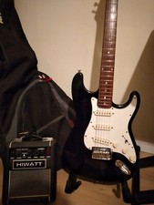 guitare + ampli +sangle+housse+cable