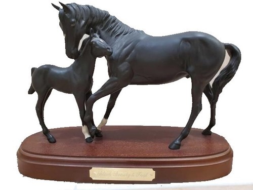 Black beauty and foal - and,
